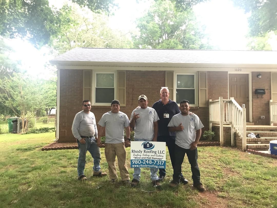 The Rhody Roofing crew after wrapping up a new roof